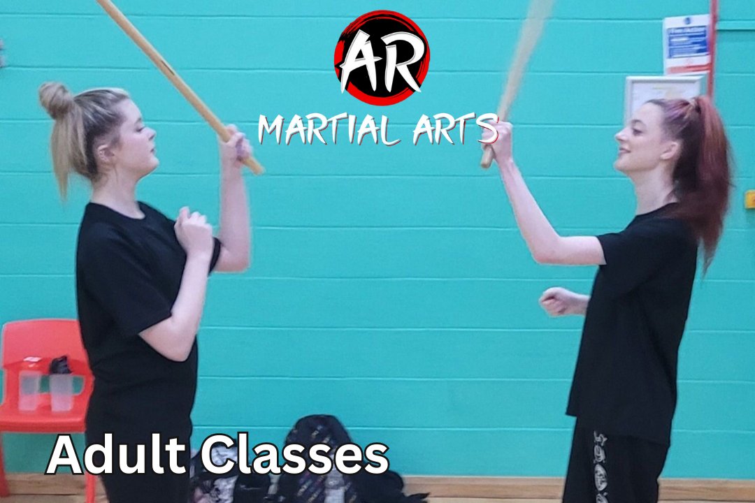 Two adult AR Martial Arts students practising Kali stick skills